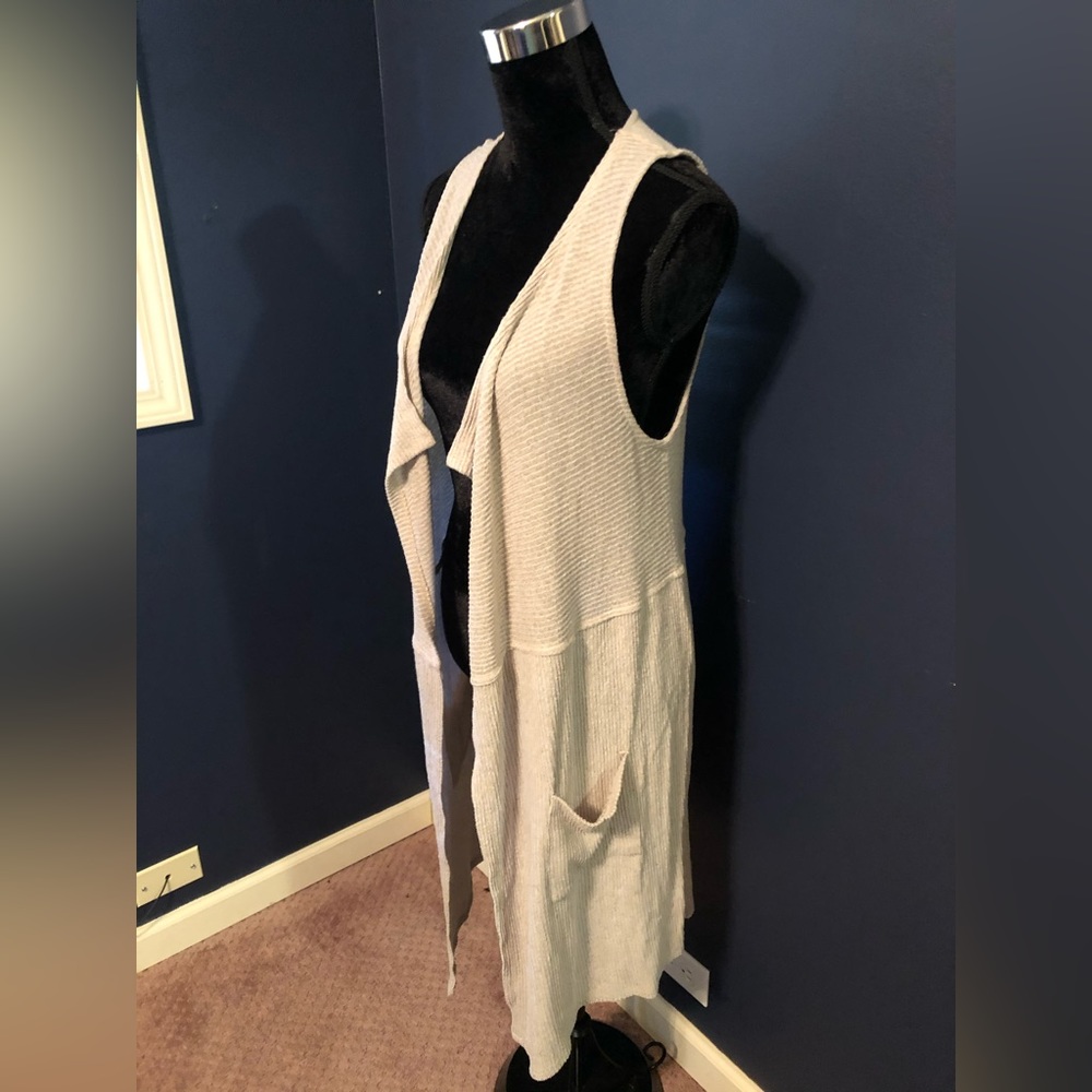 Cream colored sleeveless top cardigan